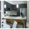 Rovere Jolie Cabinets; White Quartzite Mini-Plank Backsplash; Maple White Quartz Countertop; Pewter Oak Flooring 