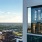 outside of tall high rise building showing the view and inside amenities
