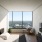 a bedroom with a large window
