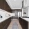 open kitchen with island and range and dark brown cabinets