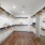 large walk-in closet with recessed lighting